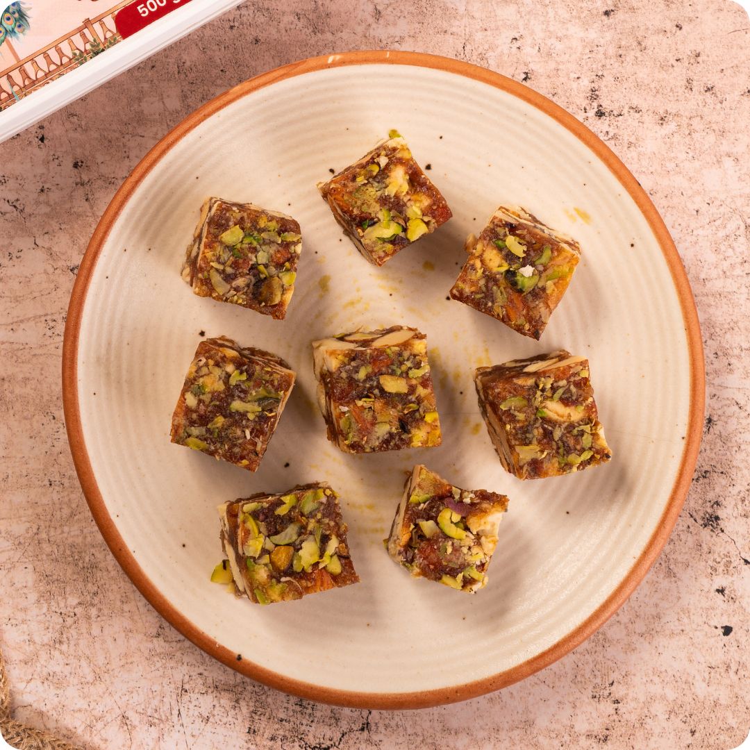 Healthy dates bites with dry fruits honey and A2 ghee
